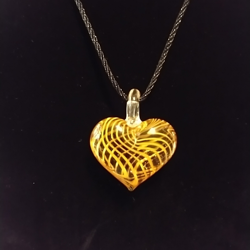 Glass‎ heart necklace on black cord
